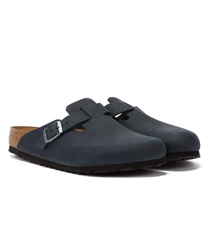An unquestionable classic  Birkenstock never miss when it comes to the Boston. Complete with their standard cork footbed underfoot  this extra-thick  oiled nubuck leather clog combines an adjustable strap with an EVA sole unit and cork-latex combo. Made in Germany  of course.