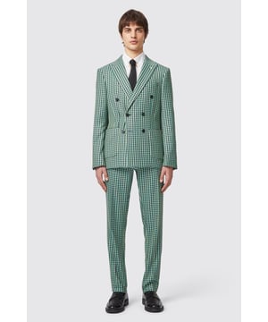Get ready to make a statement with the Morrison Suit in a bold green check! With its slim fit and unique houndstooth pattern, these flat front trousers, featuring slanted front pockets are sure to turn heads. Complete the look with the matching double breasted jacket. Featuring a peak lapel, patch pockets, and double darts, this jacket is both stylish and functional. Pair with a crisp white shirt &amp; a black tie for a perfect Spring ensemble.