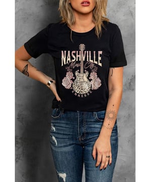 Trendy and stylish womens t-shirt
  Made with Quality materials
  Leopard guitar rose print for a unique and fashionable look
  Short sleeves for added comfort
  Versatile design that can be paired with jeans or skirts