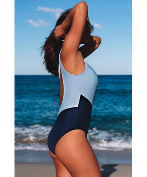 Stylish and trendy one-shoulder design
  Backless feature adds allure
  Color block pattern for a visually appealing aesthetic
  Made with Quality materials
  Comfortable and durable
  Perfect for lounging by the pool or taking a dip in the ocean