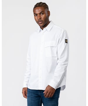 A go-to smart casual style, the Scale Shirt is crafted from a structured cotton twill and garment-dyed for a rich, saturated colour.Garment-dyed cotton twillLong sleeve shirtPoint collarAdjustable buttoned cuffCentre front button fasteningSignature tilted flap pocketBelstaff Phoenix patch on sleeve100% CottonProduct ref: 104537BLACK
&nbsp;
