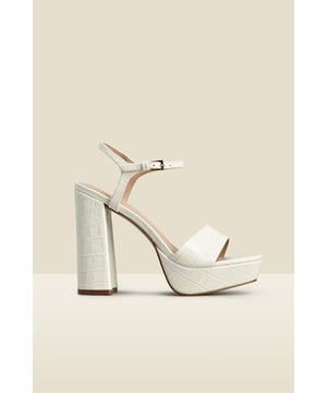 REASONS TO BUY:

Take your look to the next level
Platforms are trending
Luxe croc leather
You won't believe how comfy they are
Style with a silky blouse and flared jeans
Pair with a dress for weddings and parties.