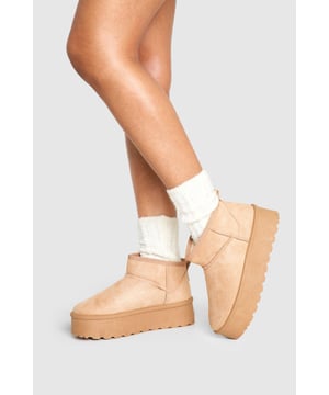Stock up for winter with these fur-lined boots. Featuring a warm and comfortable material, these boots are easy to wear for every occasion. From heading out to the shops or venturing on a winter break, we've got you. The boots feature a fur trim and have a luxurious design, and you can wear them anytime, from everyday plans to formal occasions. Pair them with your favourite pair of jeans and oversized jumper for an everyday look. Swap out the jeans with cigarette trousers and throw on a blazer for a classic evening outfit. Style: Cosy BootsFabric: Immy