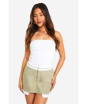 A pair of shorts that resemble a skirt...what more could a girl want? Designed to give you a bit more freedom while still looking cute, this skort is the perfect combination of style and practicality. From floaty skorts for summer days to white skorts perfect for showing off those bronzed pins, just team with chunky trainers and a crop top and your go-to off duty look is sorted. Summer styling has literally never been this easy. From trending cargo skorts to floaty printed options, shop it all on boohoo.Style: SkortsFabric: PolyesterLength: Short