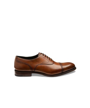Loake Hughes Hand Painted Shoe Chestnut
A premium semi-brogue with a generous fit and bold toe shape. The light brogue detailing and straight toe cap gives Hughes and uncomplicated design, boasting effortless class and style to be worn easily with suiting or chinos.

100% Premium Leather
Rubber & Leather Goodyear welted sole
Semi Brogue
Unique Finish from Hand Painted Technique
Style - HUGHES