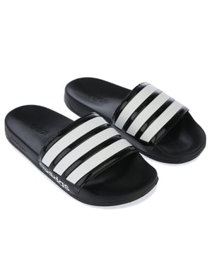 Womens adidas Adilette Shower Slide Sandals in black- white.- Slip-on construction.- Soft and quick drying. - Contoured footbed. - Soft Cloudfoam footbed.- EVA outsole. - Synthetic Upper  Synthetic Lining  Synthetic Sole.- Ref.: FZ2852