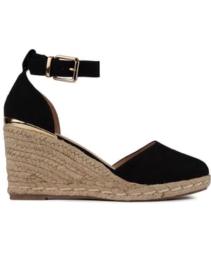 Alpargatas con cuña Solesister espa para mujer en color negro, fabricadas en sintético y suela sintética. Incluye: cuña y plataforma de alpargata, ribete metálico en el talón y forro y calcetín sintéticos.