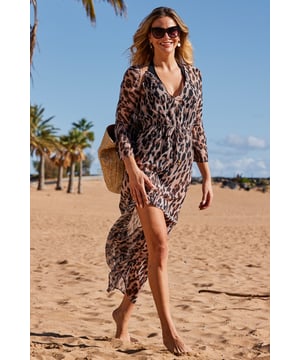 Beach glamour? Nailed it
Lightweight sheer fabric to keep you cool in style
Flare sleeves for a glam silhouette
Tie detail to show off your waist
Throw it over swimwear
Add glamour with wedges and jewellery