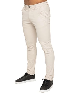 Indulge in the ultimate comfort and style with our ENZO Mens Designer Skinny Fit Chino Pants. Featuring a sleek zip fly fastening, two front pockets, two back welt pockets, and the signature Logo Branding on the Back Waist Patch