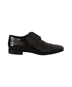Marca: Dolce & Gabbana  
Condición: Nuevo con etiquetas  
Estilo: Zapatos oxford formales derby con punta alada  
Color: Negro  
Material: 100% Cuero  
Suela: Cuero  
Forro: Cuero  
Detalles del logo  
Hecho en Italia  
Material: 100% Cuero