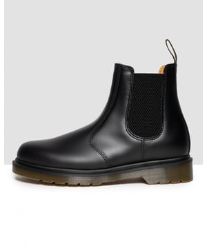 The Dr. Martens unisex 2976 Chelsea boot is a slick, uncompromisingly fashion-forward look for both men and women. With a sure fit and an easy-on, easy-off elasticised ankle, it's a versatile boot that works with everything.Part of the Lost Archives collection, this boot is made with Smooth, a lightly textured, highly durable leather with a soft sheen. It's built to last using one of the finest methods of construction: the Goodyear Welt — which means the upper and sole are sewn together in heat-sealed z-welt stitch. The boot sits on the iconic air-cushioned AirWair™ sole, which is oil and fat resistant, with good abrasion and slip resistance.
Upper: 70% Leather, 30% ElasticLining: 55% Leather, 45% TextileSole: 100% PVC