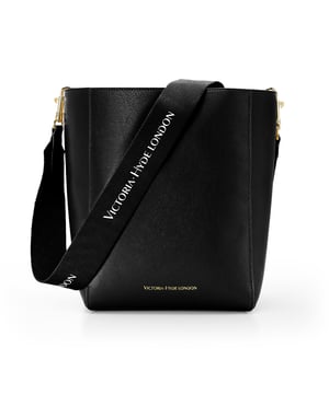 The Romai in black by Victoria Hyde London is your perfect everyday companion. Never before has functionality and trendiness been so seamlessly combined.  It is a perfect bag for the essentials you need.

Dimensions: 23cm x 30.5cm x 17cm
Surface material: PU leather (lychee pattern)
Lining: PU leather (fine grain)
Shoulder Straps: Twill Cotton Webbing

Romai handbag is available in green and yellow colors.