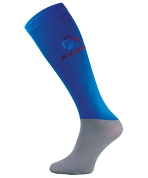 Comodo Microfibre Horse Riding Socks  Comodo have been providing high-quality socks for men and women since 1996. They sell a range of socks for hiking, cycling, hunting, skiing, and now, horse riding! Whichever type of socks you wear, your feet are bound to feel comfortable and warm, no matter the weather or environment!  It's important to wear soft and comfortable socks when horse riding. That's why Comodo have crafted microfibre horse riding socks foe men and women.  These socks are lightweight and functional as they fit effortlessly under riding boots for a cool, comfortable ride.  They have been constructed in fine microfibre to provide maximum protection against abrasion, and the breathable knit keeps legs cool in the summer and warm in the winter.  The soft touch cotton material also helps to wick away moisture and sweat especially, if you've been horse riding for longer hours in the summer.  With their support and reinforcements in all the right places, Comodo riding socks are sure to look great and maintain their condition wear after wear.  Choose from these colourful block panels for your favourite pair of horse riding socks. These socks are made from 45% Polyamide Microfibre, 25% Cotton, 25% Polyamide, 5% Elastane. They are available in sizes 3-5.5 UK, 6-8 UK, 35-38 EU, 39-42 EU. These socks are hand washable at 30 degrees.  Extra Product Details  - Microfibre Horse Riding Socks  - Lightweight Feel  - Microfibre Leg  - Knee-High Length  -Cotton Foot  - Reinforce Sole  - Men and Womens  - Hand Washable at 30  - 45% Polyamide Microfibre, 25% Cotton, 25% Polyamide, 5% Elastane