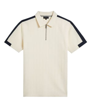 Ted Baker Abloom Men's Cream Polo Shirt, a harmonious blend of sophisticated style and casual elegance. Meticulously crafted with attention to detail, this polo shirt exemplifies Ted Baker's commitment to quality and contemporary design, offering a versatile wardrobe essential for the modern man.

Key Features:

 Premium Cotton Fabric:  The Abloom Polo Shirt is crafted from high-quality cotton, ensuring a soft and breathable feel against the skin. The premium fabric not only enhances comfort but also exudes a sense of luxury, making it an ideal choice for both casual and semi-formal occasions.

 Timeless Cream Palette:  The cream hue of this polo shirt adds a touch of timeless refinement to your wardrobe. Versatile and sophisticated, the neutral color allows for effortless pairing with a variety of bottoms, making it a versatile piece for various occasions.

 Embroidered Branding:  The Ted Baker logo is subtly embroidered on the chest, reflecting the brand's commitment to quality and style. The discreet branding adds a touch of sophistication without overshadowing the shirt's overall design.

 Comfortable Fit:  The Abloom Polo Shirt is tailored for a comfortable and flattering fit. With a balance between a relaxed and polished silhouette, it allows for ease of movement while maintaining a refined appearance.

 Versatile Styling Options:  From casual outings to semi-formal events, this polo shirt provides versatile styling options. Pair it with shorts for a laid-back look or combine it with tailored trousers for a more polished ensemble.

 Easy Care:  Designed for practicality, the Abloom Polo Shirt is easy to care for, allowing you to enjoy its impeccable style without the hassle of complicated maintenance.