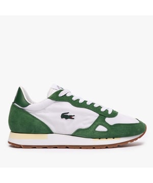 Mens Lacoste Partner 70s Trainers in white.- Suede overlays.- Lace up fastening.- Lacoste woven label on tongue.- Textile quarter panels.- Embroidered crocodile.- Rubber outsole.- Ref: 47SMA0120WG1