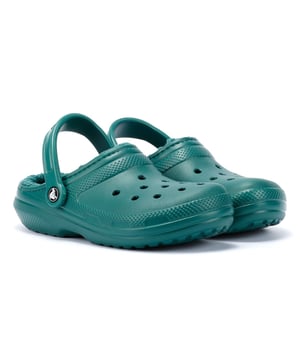 Geniet van comfort met onze Classic Clog, verrijkt met een warme en donzige voering voor een behaaglijk gevoel. Deze klompen zijn gemaakt met Croslite™ schuimkussentjes, waardoor ze licht en gemakkelijk te dragen zijn. De draaibare hielriempjes zorgen voor een stevige pasvorm, waardoor ze een perfecte mix van comfort en functionaliteit zijn. Aanpasbaar met Jibbitz™ bedels.