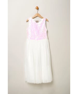 Dazzle and delight in this enchanting sequin bow dress from Luna Moon by Miss, adorned with a large bow on the back. Perfect for special occasions, this stunning ensemble exudes elegance and charm, seamlessly transitioning from shimmering sequins to a dreamy tulle skirt. Elevate your little one's style with this shimmering masterpiece, guaranteed to make a statement and capture hearts wherever she goes. Shop now for the perfect blend of sparkle and sophistication!