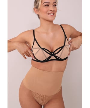 -Gerichte taille- en buikmodellering - Koord achteraan voor onzichtbare pantylijn -Ademende, lichtgewicht stof. Kruis van biologisch katoen. -Valt klein uit