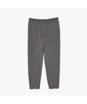 Kies een trainingsbroek die net zo uniek is als jij. Geverfd met natuurlijke pigmenten voor een origineel, individueel resultaat. Draag met het bijpassende sweatshirt voor een moeiteloze, opvallende look. Dit unisex product valt groot. Als je een vrouw bent, kies dan 2 maten kleiner dan je gebruikelijke maat. Als je een man bent, kies dan 1 maat kleiner dan je gebruikelijke maat.- Biologisch katoen.- Ontspannen, comfortabele pasvorm.- Zakken aan de zijkanten.- Elastiek aan de onderkant van de pijpen.- Ton-sur-ton trekkoorden.- Ton-sur-ton krokodil van 3 cm aan de linkerkant. Materiaal: 100% katoen. Ref: XH3451S0I.
