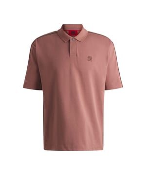 Mens Hugo X RB Branded Tape Polo Shirt in pink.- Polo collar.- One button placket.- Short sleeves.- Branded tape on the sleeves and a chest logo.- Relaxed fit.- Ref: 50530101689