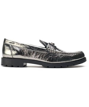 Stride Out In Style, With These Gleaming Jocelyn Loafer Pumps From Coach, Merging Traditional Design With Contemporary Sophistication And Classy Chic. This Distinguished Staple Is Made From High-quality Leather And Paired With A Cleated Rubber Outsole For A Sturdy Grip While Preserving A Vogue Appearance. Adorned With Luxe Brass Coach Hardware, These Fabulous Metallic Leather Shoes Have An Elegant Silhouette.