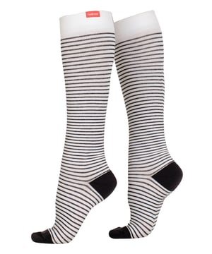 Energize your legs! Using integrally-knit graduated compression, these compression socks apply therapeutic pressure that starts at the ankle and gradually eases above. It’s this external pressure that energizes your legs and Reduces Swelling. These socks have a 30-40 mmHg compression level that is ideal for all-day, everyday wear, sitting or standing for long periods. High-quality premium cotton fibers and Spandex throughout the sock allow for sustained compression throughout the day. Alleviate achiness & heaviness by squeezing the legs from the bottom up, our legwear can help increase circulation of freshly oxygenated blood back to your legs. These are made for people with circulation problems and also ideal for flight travel, pregnancy, exercising, when sitting or standing for long periods of time and even during visits to hospital. These socks are specially designed to energise legs, reduce swelling, alleviate achiness & heaviness and to aid in muscular recovery. The specially designed fabric cotton blends and The 200-needle count gives supreme comfort and flexibility which contours leg and heel for superior fit. These socks are comfortable and breathable with graduated compression from ankle to calf with a contoured leg and heel for a great fit. The flexible toe pocket doesn’t squeeze the toes! They are also the extra wide style to fit comfortably around the wider legs and calves. Tested & Trusted: Based out of Missoula, Montana, VIM & VIGR is dedicated to creating products that provide you with everyday relief. VIM & VIGR graduated compression legwear was developed in partnership with vascular surgeons and vein clinics and all products are listed with the Food and Drug Administration (FDA). These compression socks are available in 4 colours and 3 sizes: Small/Medium, Medium/Large and Large/X-Large. They’re made out of 48% Cotton, 42% Nylon, 10% Spandex (Latex-free).