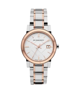 Unveil a harmony of design and function with the Burberry Watch, model BU9105. This exquisite watch is a symbol of luxury, featuring a two-tone stainless steel bracelet with rose gold accents that exude a contemporary elegance. The minimalist white dial is complemented by rose gold hands and hour markers, along with a discreet date window for added functionality. Swiss-made with a quartz movement, this watch promises precision and reliability. Its refined aesthetic and water-resistant construction make it a sophisticated accessory for any occasion, reflecting Burberry's commitment to exceptional craftsmanship and timeless style. Specification Details Brand Burberry Model BU9105 Barcode Number 822138033220 Gender Unisex Case Diameter 34 mm Case Material Stainless Steel Case Colour Two-tone (Silver and Rose Gold) Dial Colour White Band Material Stainless Steel Band Colour Two-tone (Silver and Rose Gold) Movement Swiss Quartz Water Resistance 5 ATM Features Date Indicator