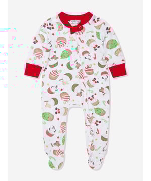 Introducing the Baby Festive Cupcakes Zipper Babygrow in Red, carefully crafted by Magnolia Baby. This delightfully designed item is perfect for Baby Unisex during the joyful Christmas season: Chic Design: The babygrow features an exquisite festive cupcakes print, adding a sparkle of trendiness to the attire. Comfortable Wear: Made from premium quality fabric, it promises utmost comfort for your baby's day-to-day activities. Unisex Appeal: This Baby Festive Cupcakes Zipper Babygrow, in fetching red, is a fabulous addition to any baby's wardrobe, irrespective of their gender. Get ready to have your baby looking adorably chic and comfortable this Christmas season!