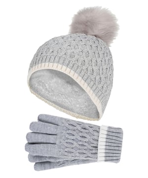 Dress your kids cosy this Winter Season with Heat Holders Ice Palace themed hat and gloves for girls! Toasty kids are happy kids! Make sure your child stays warm for Winter fun in these comfy matching hat and gloves set. This chunky pom pom hat and gloves are knitted in an attractive diamon-like design. They are soft yarn with a ribbed hem and incorporates the latest HeatWeaver® thermal lining, a luxurious, plush fur-like insulating fabric, that maximises the amount of warm air held close to the skin. The specially developed thermal yarn provides high performance insulation against cold with superior moisture breathing abilities. Made from stretchable construction, these hat and gloves set contours around the natural shape of your child's body for a better improved fit, warmth and comfort. Your kids will look and feel stylish whilst keeping warm in these very cute and comfortable pull on beanie hat. The pom pom detail on the top of the hat makes for an adorable Winter look! Designed to keep your child warm during the cold months, these gloves feature a turn over cuff so you can adjust the gloves according to your child's wrist for a cosy fit! They come in 5 colours ranging from Cloud Greym, Buttercream, Dusky Pink, Lavender Frost, Al Blue. These hats and gloves are available in 7-10 years.