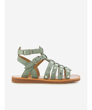 Introducing the astonishingly chic Pom D'Api Leather Plagette Stud Sandals in Grey, the ultimate accessory to spruce up your girl's Holiday wardrobe! The key attributes making it a cut above the rest include: Designer Look: Crafted by renowned designer Pom D'Api, these sandals ensure an impeccable high-end style.  Premium Leather: Made of high-grade leather, these sandals promise durability + comfort, ideal for your girl's frolics! Stylish Studs: The chic studs detailing add a dazzling touch, setting a new trend!Revitalize your girl's wardrobe by adding these exquisite Leather Plagette Stud Sandals in Grey by Pom D'Api. Let her strut in style! Order now.