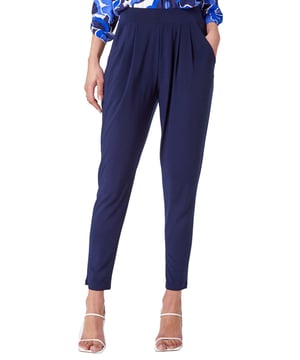 Elastic Waist Hareem Trousers from Roman. Show off at your next occasion and style our straight hareem trousers essential for your new season wardrobe. Featuring practical angled pockets, these trousers are cut from a smooth stretch jersey fabric and boast a comfortable and flattering fit with a wide waistband. Pair with a top, jacket, and ankle boots to create an effortless outfit.