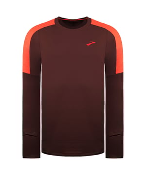 The Brooks Notch Thermal 2.0 Running Top is designed to keep you warm and comfortable during chilly runs. With its thermal fabric and moisture-wicking technology, this top offers a perfect balance of insulation and breathability, making it a must-have for cold-weather training.

Key Features:
Manufacturer Colour:

Run Raisin/Vivid Flame

Thermal Insulation:

Soft, brushed thermal fabric traps heat to keep you warm during cold-weather runs without adding bulk.


Moisture-Wicking Performance:

DriLayerÂ® fabric efficiently wicks sweat away, ensuring you stay dry and comfortable even during intense workouts.


Breathable Design:

Breathable material prevents overheating by maintaining airflow while retaining warmth.


Comfortable Fit:

Semi-fitted design ensures freedom of movement and layers easily under a jacket or vest.


Thumbholes and Cuffs:

Built-in thumbholes keep sleeves in place and provide added warmth for your hands.


Zippered Storage:

Features a discreet zippered pocket for securely storing small essentials like keys or cards.


Reflective Details:

Integrated reflective accents improve visibility in low-light conditions, enhancing safety during early or late runs.


Modern Style:

Sleek and functional design with versatile styling, suitable for both workouts and casual wear.



The Brooks Notch Thermal 2.0 Men's Running Top delivers warmth and performance, helping you tackle cold runs with confidence.