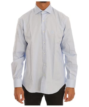 Prachtig ROBERTO CAVALLI overhemd  
100% Authentiek en gloednieuw met labels  
Spread collar  
Lichtblauwe kleur  
Volledige knoopsluiting  
Logo-details voor een vleugje luxe  
Gemaakt van 100% katoen  
Geweldige pasvorm en comfort  
Materiaal: 100% Katoen