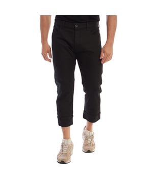 Emporio Armani denim pants with five-pocket design and button closure, combining elegance and casual style.

 Made from denim, it offers a straight and comfortable fit, ideal for a versatile and modern look.

 The metal-engraved details with the brand's logo, discreetly placed on the small pocket and on the back pocket, add a distinctive and exclusive touch.

 Rolled hems at the ankles add a contemporary touch, making these pants a perfect choice for both casual combinations and more refined outfits with a touch of sophistication.
 Composition: 98% Cotton, 2% Elastane
 Care:
- Machine wash on gentle cycle.
 - Use similar colors in the wash.
 - Avoid the use of bleaches.
 - Dry at low temperature in the dryer.
 - Iron at low temperature.
 - Do not dry clean.