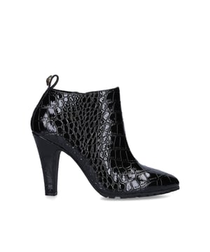 The Shoreditch Bootie is crafted from croc embossed shiny cow leather for structure and durability. The ankle tab is topped with mini antiqued brass Eagle head with all over feather texture and opaque brass crystals. Heel height: 10cm. Concealed inner side zip with leather pull tab. Material: Embossed cow leather.