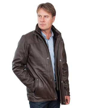 A beautifully tailored warm leather jacket crafted from soft supple Nappa Leather. This jacket features an YKK Zip fastening that is overlapped by covered press studs for added comfort. To help keep the cold wind at bay you will a high funnel neck collar. In addition there is an inner fleece line collar that adds an extra layer of comfort and insulation. For added practicality this jacket features five external pockets one vertical zipped at the chest and another two zipped pockets at the hip plus two open handwarmers. To help provide a more customised fit the cuffs are adjustable with a press stud fastened strap which allows them to be cinched in.