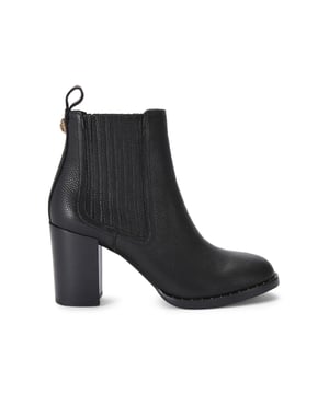 The Kurt Geiger Heritage Boot features a black tumbled leather upper. There is a rainbow stitched pull tab at the back of the ankle above a small antiqued brass eagle head. Heel height: 8.5cm.