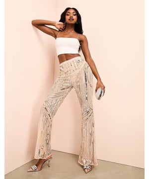 Trousers & Leggings by ASOS Luxe For when you wanna be a lil' dramatic Bead and sequin embellishment High rise Flared slim fitSold By: Asos
