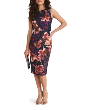 Embrace elegance with the Lorna Scuba Dress, perfect for any casual occasion with its stunning floral pattern and sleek design.