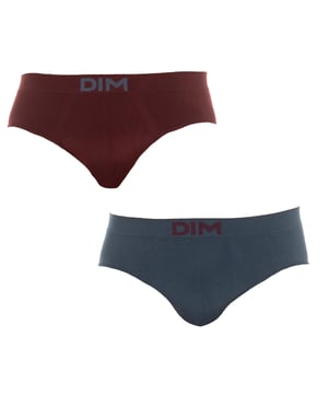Pack-2 slips Unno Basic by Dim.
Color Verde marino-granate.
Cinturilla elástica, con nombre de la marca en la parte central.
Tejido transpirable.
Frontal anatómico con capacidad de sujetar sin apretar.
Sin costuras.

Composición:  84% Poliamida. - 15% Elastano. - 1% Poliéster..

Cuidados:
- Lavara a mano a temperatura máx. 40º.
- No utilizar lejía.
- No permite el uso de secadora.
- No planchar.
- No lavar en seco.
