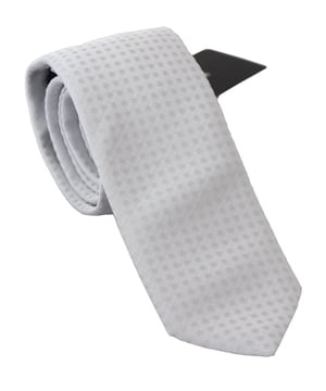 Corbata Dolce & Gabbana.
  100% autentico y nuevo con etiquetas.
  Corbata exclusiva de la coleccion MainLine de Dolce & Gabbana.
  Color: Blanco estampado.
  Material: 66% nailon 34% seda.
  Ancho: 6cm.
  Fabricado en Italia.
