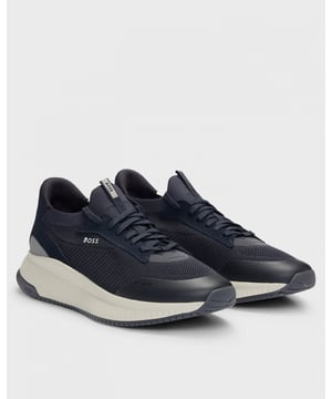 Expertly crafted with a ridged outsole for a sportive profile, these trainers are designed in a combination of materials including smooth leather. Signature detailing appears throughout for a distinctive touch.

Laces
Partially lined
Packaging: Box

85% Polyester (recycled) , 15% Polyester, 100% Polyester, 85% Polyester, 15% Polyurethane, Sole: 70% Ethylene vinyl acetate, 30% Rubber, Facing: 100% Thermoplastic polyurethane, 100% Cow skin, Upper material: 85% Polyester (recycled), 15% Polyester, Innersole: 100% Polyester
 
50523113
 