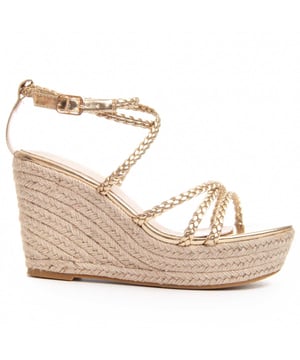 Women's esparto wedge sandal. Cushioned natural leather insole. Comfortable fit. Non-slip sole. Reinforced stitching. Manufactured by other brands for our brand. Approximate measurements: 12 cm wedge and 3 cm platform.