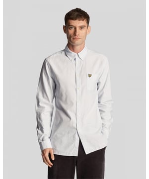 Button-down collar.Long sleeves with button cuffs.Full button fastening.Chest pocket with golden eagle tab.Stripe pattern.Regular fit.
