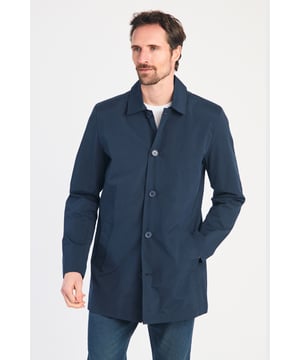 This men's mac-style coat from Kensington Eastside features a classic collar, button-up fastening, and a mid-length cut for a sleek, modern look. Lightweight and stylish, it’s perfect for layering over both casual and formal outfits, making it a versatile wardrobe essential for effortless style.