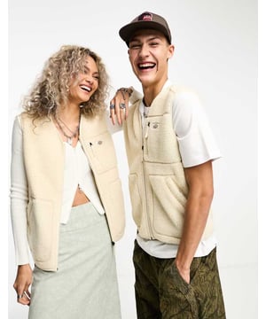 Tops by Dickies Add-to-bag material V-neck Zip fastening Logo patch to chest Functional pockets Regular fit Unisex styleSold By: Asos