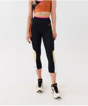 High waisted, calf length finish leggings in matte fabrication. Functional drawcord at waist and pockets on both sides. P.E Nation embroidered logo at hip