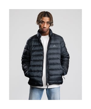 Designed for layering, the Light Down Jacket will be your go-to jacket when the temperature begins to drop. With a narrow, flattering fit and a high percentage of down (90% down, 10% feathers), this jacket is super lightweight, making it easy for traveling and layering. Wear alone in brisk weather, or under a wool jacket for additional insulation during the colder months for when the temperature drops to -10 degrees Celsius.

Regular fit
Two zip pockets at front
Two-way zipper
Printed GANT logo at front

Shell - Polyester 100%, Back Lining - Polyester 100%, Sleeve Lining - Polyester 100%, Padding - Down 90%, Feathers 10%