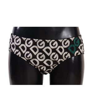 100% Auténticos pantalones Dolce & Gabbana con logo DG en blanco y negro  
Color: Estampado de logo en blanco y negro  
Modelo: Pantalón  
Material: 100% Algodón  
Detalles con logo  
Hecho en Italia  
Material: 100% Algodón