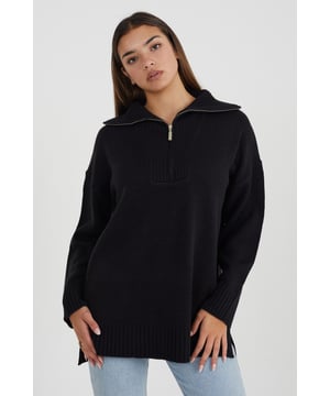 Update your everyday essentials wardrobe with this oversized jumper from Brave Soul. Cut in an oversized fit, featuring zip collar fastening, oversized ribbed collar, cuffs, and hem with side splits. Team with a pair of jeans to elevate your casual look. Model wears UK size S.